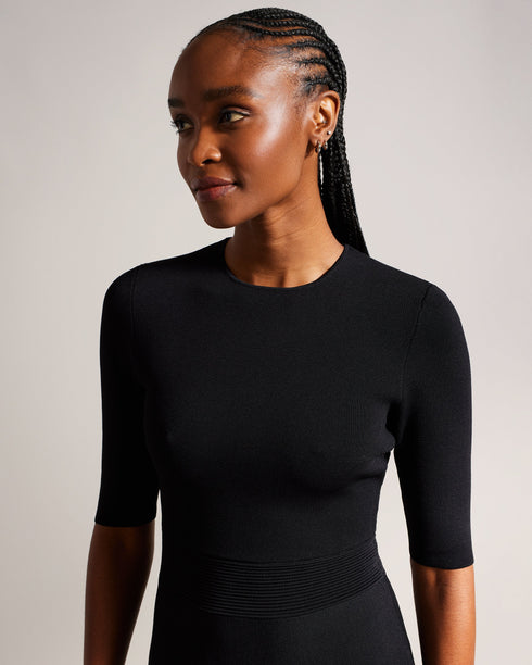 JOSAFEE-Dresses-When knitwear and glamour collide, you get JOSAFEE. This perfectly tailored mini dress boasts a figure hugging silhouette with a pleated hemline that ensures you'll look and feel fabulous in any setting, from a lunch date to a weekend exploring the city. Knitted mini dress Fit and flare silhouette Pleated hem Crew neck Half length sleeves Exposed zip fastening Ribbed waistband Jara is 5'10.5" / 1.79m and wears Dark Red in a Ted size 1 Feminine detailsA flirty pleated hem adds an interesting